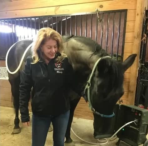 Wendy Graham with her horse Dooley, where DWT Wellness began